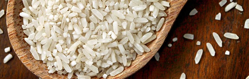 white rice in a wooden bowl